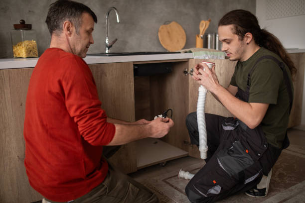 Expert drain cleaning technicians clearing blocked pipes in Chandler homes